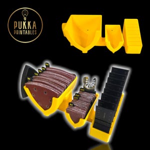 May include: Yellow sandpaper and saw blade organisers with brown sandpaper and black saw blades. The organisers have the text "PUKKA PRINTABLES" and are on a black background.