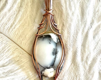 Dendritic Agate pendant wrapped in copper wire.