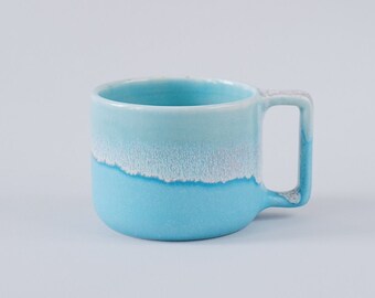 Seafruit: handmade ceramic mug, 300-350 ml, satin blue with floating glossy glaze