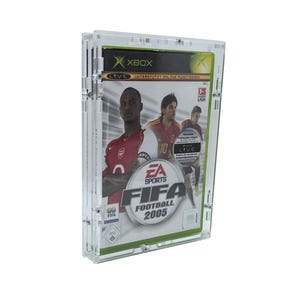 May include: A clear plastic case with a video game inside. The game is FIFA Football 2005 for the Xbox. The cover features a soccer player in a red and white jersey.