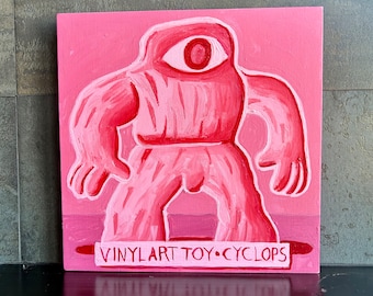 Vinyl Art Toy Cyclops painting by Alan Moyes. Pink cyclops folkart wall art. Porter street studio contemporary art.