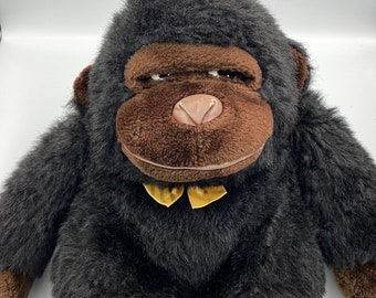 Retro 1980s Bow Tie Gorilla Monkey Soft Toy with label. Very cool and in excellent condition, cartoon eyes. Brown leather nose and mouth