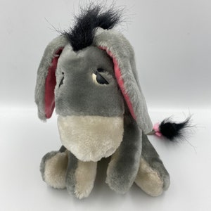 Very Sad 1980s Eeyore Donkey Vintage Soft Plush Toy from Winnie the Pooh with bundles of character. Cartoon eyes.