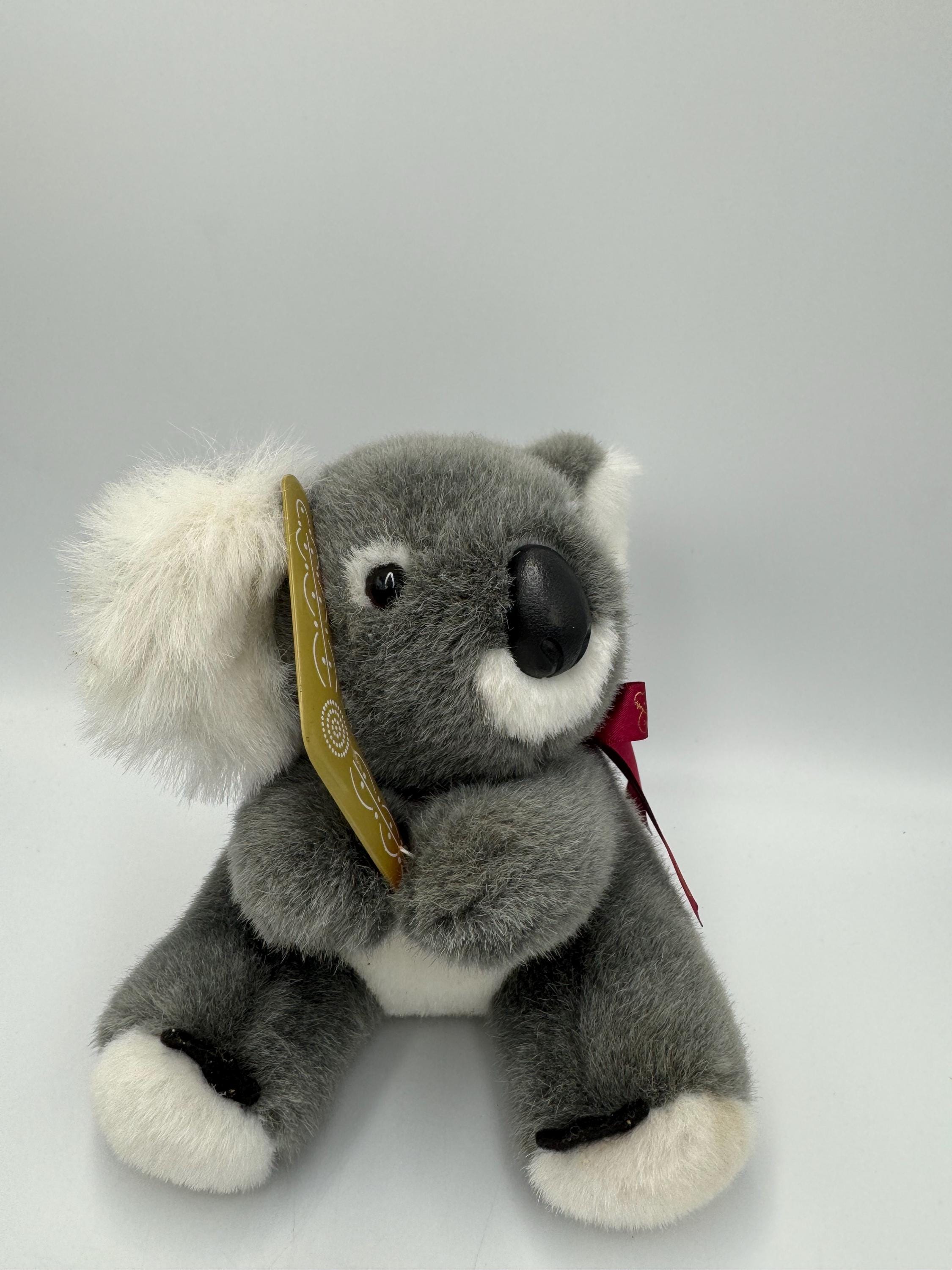 Ours En Peluche Sur Une Vieille Valise En Cuir Sur Fond De Bois Photo