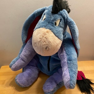 Vintage 1980s Children’s Eeyore Pyjama Case from Winnie the Pooh with bundles of character. Cartoon eyes. Excellent condition