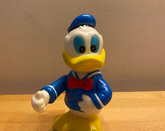 1990年代のドナルドダックのディズニー貯金箱（ストッパー付き）。色