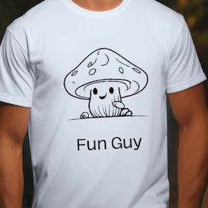 May include: White t-shirt featuring a black and white cartoon mushroom graphic and the text "Fun Guy" printed on the front.