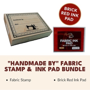 May include: A wooden fabric stamp with a sewing machine design, paired with a brick red fabric ink pad. The ink pad is 4.75" x 3" (12cm x 10cm). The set is labeled "HANDMADE BY" FABRIC STAMP & INK PAD BUNDLE.