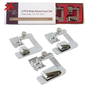 May include: A set of three silver-colored rolled hem feet for sewing machines. The box reads "3 PCS Wide Rolled Hem Set" with sizes 1/2", 3/4", and 1". The text also says "So proud those neat hems are mine. A huge time saver!"