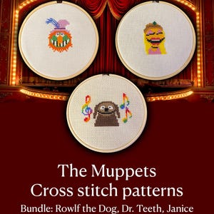 May include: Three circular wooden embroidery hoops containing cross stitch patterns of Muppet characters. One hoop features Dr. Teeth, one features Janice, and one features Rowlf the Dog with colorful musical notes. Text reads: The Muppets Cross stitch patterns Bundle: Rowlf the Dog, Dr. Teeth, Janice.
