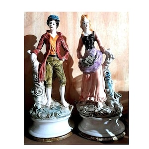 Pair of Antique Staffordshire figurines hand-painted Boy and Girl VGC