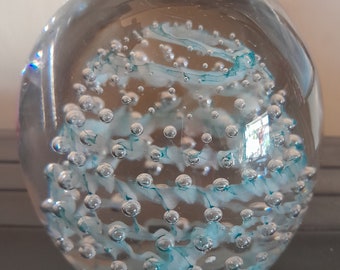 Heavy ovoid paperweight with swirly turquoise twisty controlled bubbles -slight damage