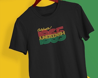 May include: Black t-shirt with a red, yellow, and green graphic design that says "Celebrate! Juneteenth 1865".