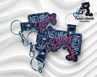 Llavero NeuroSpicy: vinilo negro brillante, orgullo neurodivergente