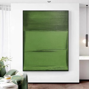 Puede incluir: Pintura abstracta con un esquema de color verde. La pintura est&aacute; dividida en tres secciones horizontales, con la secci&oacute;n superior que presenta un patr&oacute;n texturizado y rayado. Las secciones del medio y la inferior son de color verde s&oacute;lido.