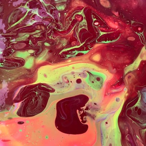May include: Abstract acrylic pour painting with a vibrant mix of colors. The artwork features flowing patterns of deep red, neon green, and yellow hues, creating a dynamic and fluid visual effect. The painting has a glossy finish.