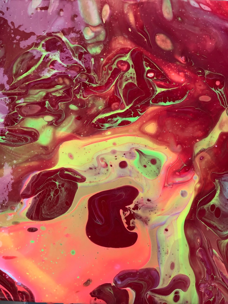 May include: Abstract acrylic pour painting with a vibrant mix of colors. The artwork features flowing patterns of deep red, neon green, and yellow hues, creating a dynamic and fluid visual effect. The painting has a glossy finish.