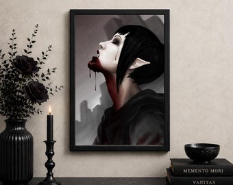 May include: A framed digital illustration of a pale figure with short black hair and pointed ears, featuring dark red liquid dripping from the mouth. The artwork is displayed in a black frame on a wall, accompanied by a black vase and candle.