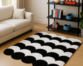 Handgefertigter Teppich aus schwarz-weißer Jakobsmuschelwolle - moderner geometrischer Teppich