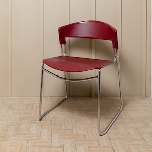 Vintage stacking chair by Paolo Favaretto for Assisa - Italy 1986 - chrome and plastic in red - design classic