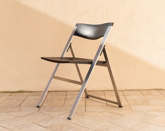 Tecno folding chair P08 - design Justus Kolberg - steel and black plastic - made in Italy 1990s