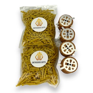May include: A clear plastic bag filled with yellow beeswax incense sticks. The bag has a white label with the text "ORTHODOX.GIFTS" and a gold cross. Four round cork incense holders with metal cross designs are arranged vertically.