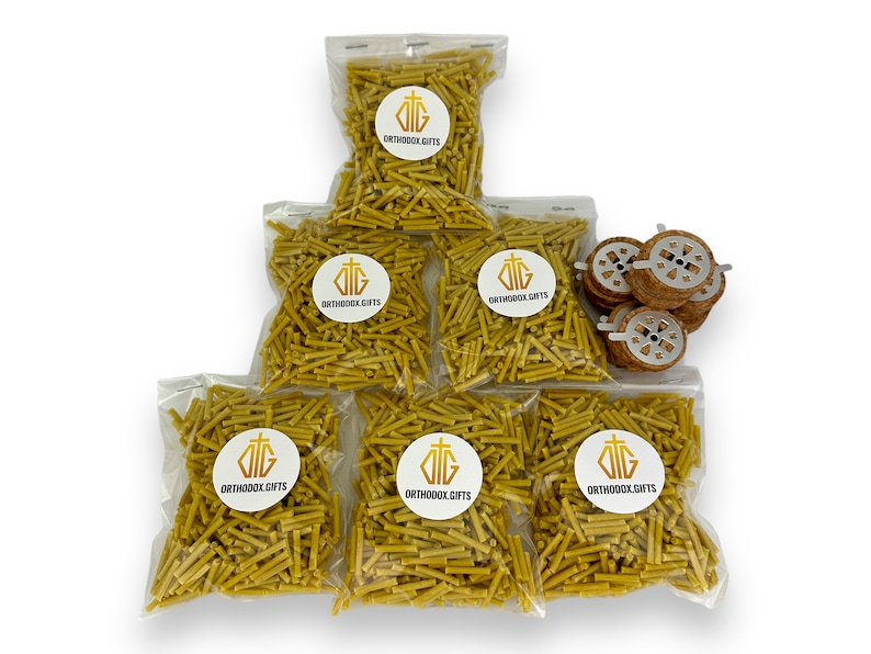 May include: Six bags of yellow beeswax candle wicks, each bag labeled "Orthodox Gifts" with a cross logo.  A separate bag contains five round, wooden candle holders with metal inserts.