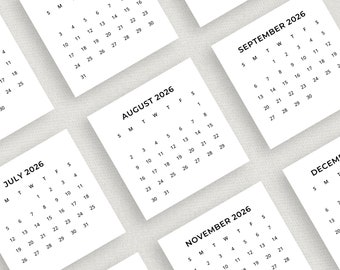 May include: A set of 10 calendar cards for the year 2026, each card features a month of the year with the days of the week labeled. The cards are white with black text.