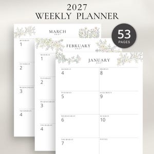 May include: A 2027 weekly planner with 53 pages featuring white paper sheets. Each page displays a month name, dates, and days of the week in black text, accented with delicate floral illustrations in soft green, pink, and yellow tones.
