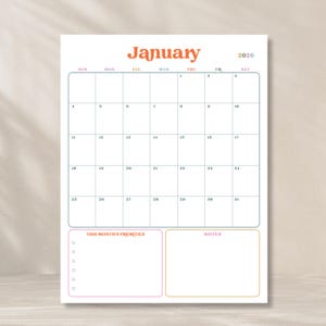 May include: A white 2026 January calendar with a colorful design. The word "January" is in orange, and the days of the week are in different colors. Includes sections for priorities and notes.