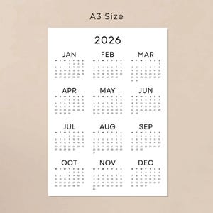 May include: A3 size 2026 calendar printed on white paper. Each month is displayed with a simple, clean layout, featuring the days of the week and dates. The calendar is designed with a minimalist aesthetic.