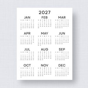 May include: A black and white 2027 calendar, printed on a white background. The calendar displays the months January through December, with each month's days arranged in a grid format. The year 2027 is at the top.