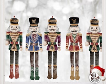 Könnte beinhalten: Fünf Aquarell-Nussknacker-Figuren mit verschiedenen farbigen Uniformen. Die Nussknacker stehen in einer Reihe vor einem verschneiten Hintergrund.