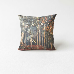 A square throw pillow with a forest scene design featuring trees, foliage, and a colorful background.