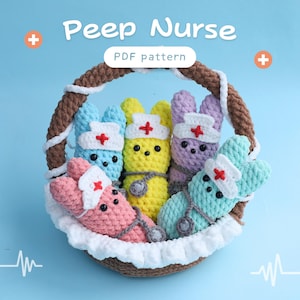 May include: Five crocheted Peep nurse plushies in a brown basket with white crocheted trim. The plushies are in blue, yellow, purple, and pink. Each plushie has a red cross on its white nurse hat. The plushies are holding a stethoscope. The text "Peep Nurse PDF pattern" is above the basket.