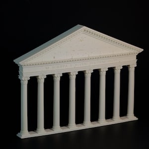 May include: A white architectural model of a classical building facade with columns and a triangular pediment. The model has the inscription "M. AGRIPPA L. F. COS. TERTIUM FECIT" above the columns. The background is black.