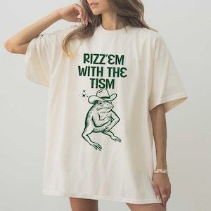 Rizz Em With The Tism Funny T-Shirt, Funny Animal Frog Graphic T-Shirt, Autism Awareness Sweatshirt, Meme Tee, Funny Gift For Women & Men