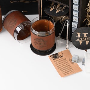 Protect your furniture in style with our beautifully crafted wooden coasters, each designed to complement the luxurious appeal of the leather-wrapped set.