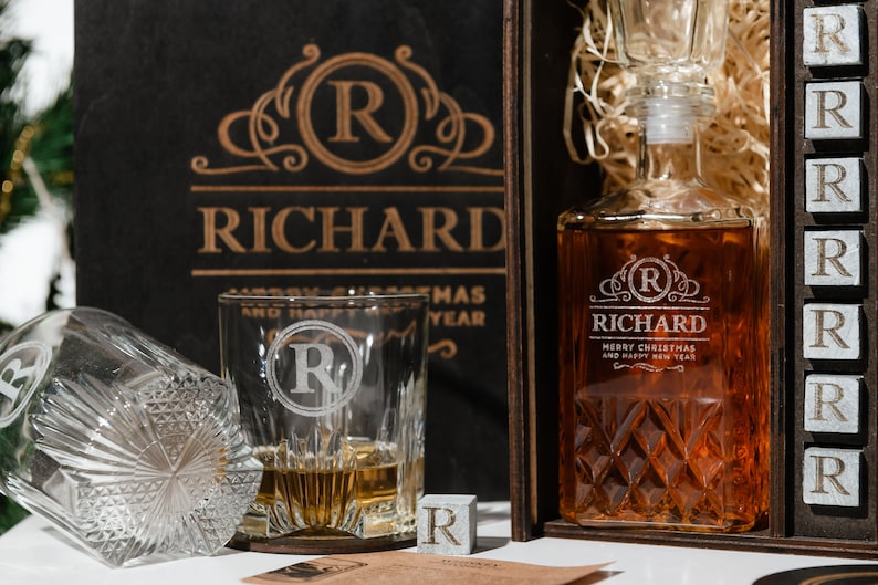 Elevate your whiskey experience with our personalized decanter set, complete with whiskey stones for the perfect chill. Its the quintessential addition to any connoisseurs collection.