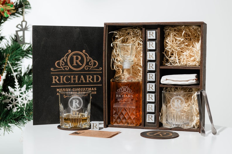 Elevate your whiskey experience with our personalized decanter set, complete with whiskey stones for the perfect chill. Its the quintessential addition to any connoisseurs collection.