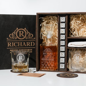 Elevate your whiskey experience with our personalized decanter set, complete with whiskey stones for the perfect chill. Its the quintessential addition to any connoisseurs collection.