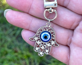 Hamsa Hand of Fatima 2.68 inch Silver colored Blue Evil Eye key chain