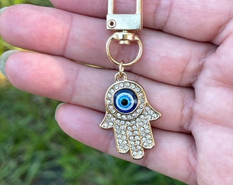 Hamsa Hand of Fatima 2.62 inch Gold colored Blue Evil Eye key chain