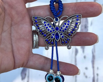 Silver 4.45 inch butterfly with blue evil eye keychain