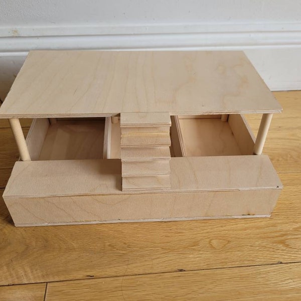 Hamster sandbox with platform for wheel