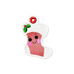 May include: A red and white Christmas stocking with a smiling face and a green holly sprig on top. The stocking has a white fur trim and a red loop at the top.
