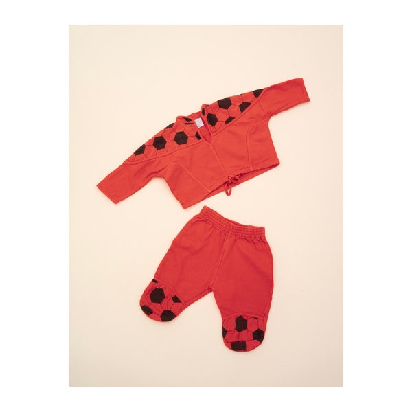 Vintage toddler red tracksuit sweatshirt and trousers with a soccer ball print Made in France 12M