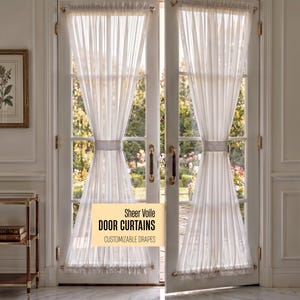 May include: Sheer white voile door curtains hanging on a set of double doors. The curtains are gathered at the top and bottom, with a band of fabric in the middle. The text on the image reads "Sheer Voile DOOR CURTAINS CUSTOMIZABLE DRAPES."