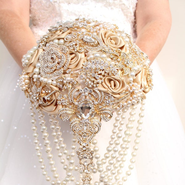 Champagne cascading brooch bouquet. Elegant wedding pearl bouquet. Extra bling gold jeweled bridal bouquet