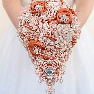 Copper rose gold cascade brooch bouquet. Terracotta jeweled bouquet. Burnt orange wedding.